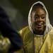 A Pioneer cheerleader laughs on the sidelines in the first half of the game against Skyline on Friday. Pioneer won 50-0. Daniel Brenner I AnnArbor.com